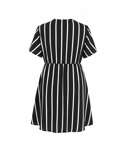 Rückseite Bloom Candy Kleid in Schwarz mit cremeweißen Streifen.