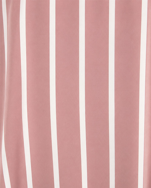 Details Bloom Candy Kleid in Rosa mit cremeweißen Streifen.